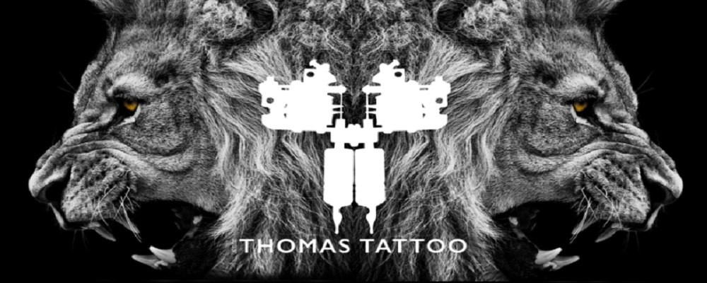 Jesse Thomas Tattoo logo